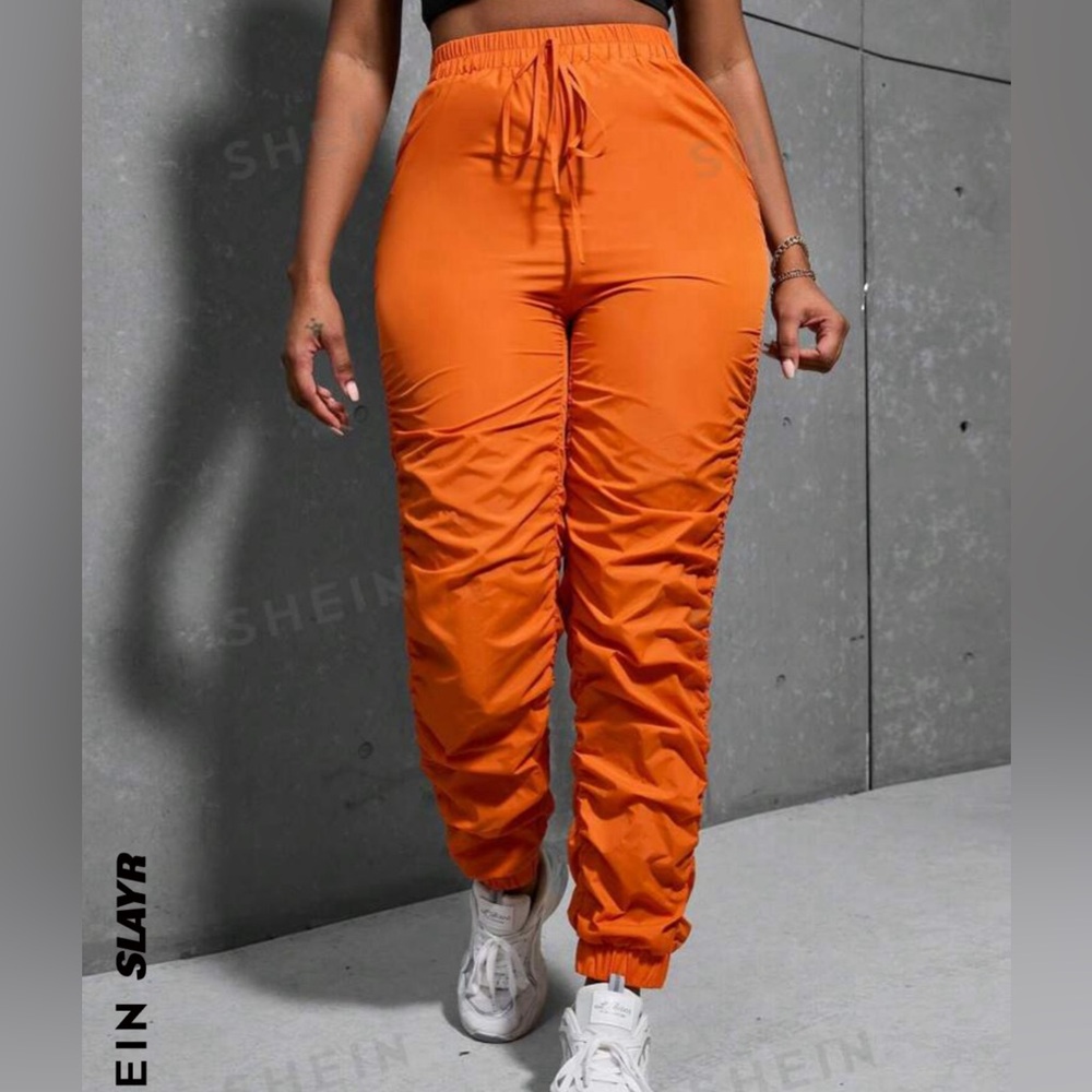 Orange scrunched joggers